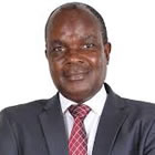 PROF. JOHN D. MANDE