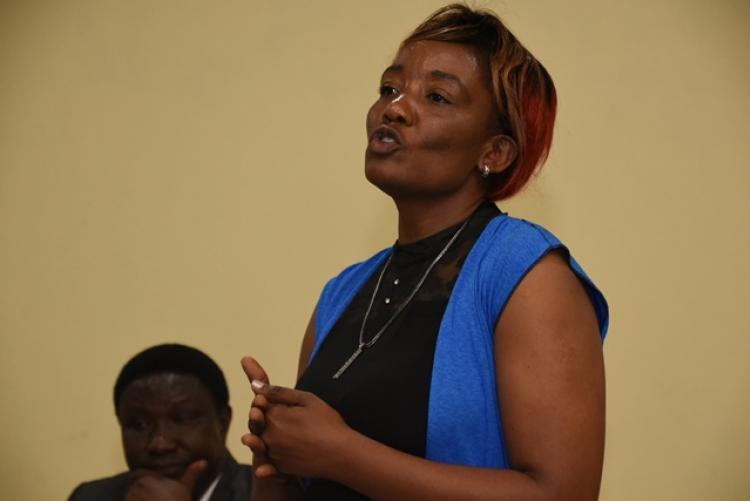 Dr Esther Ogoro speaking at the end-of-year-party-2019 for the Examinations