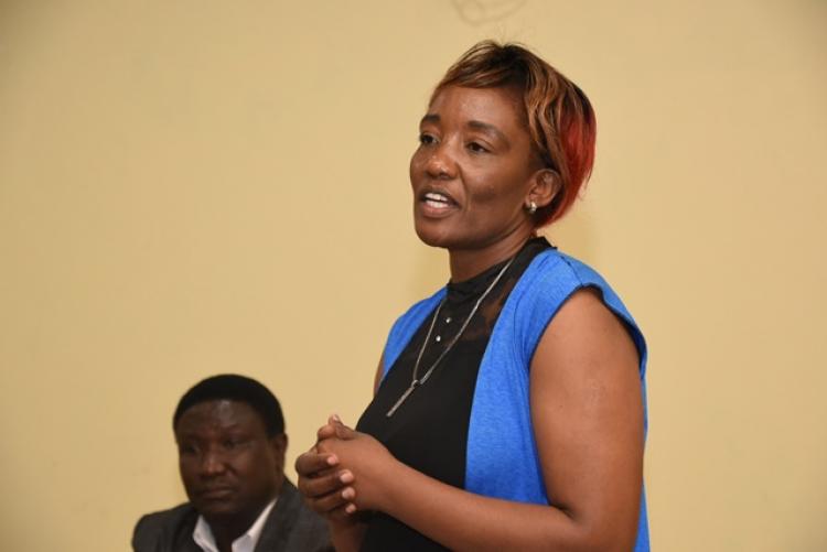Dr Esther Ogoro speaking at the end-of-year-party-2019 for the Examinations