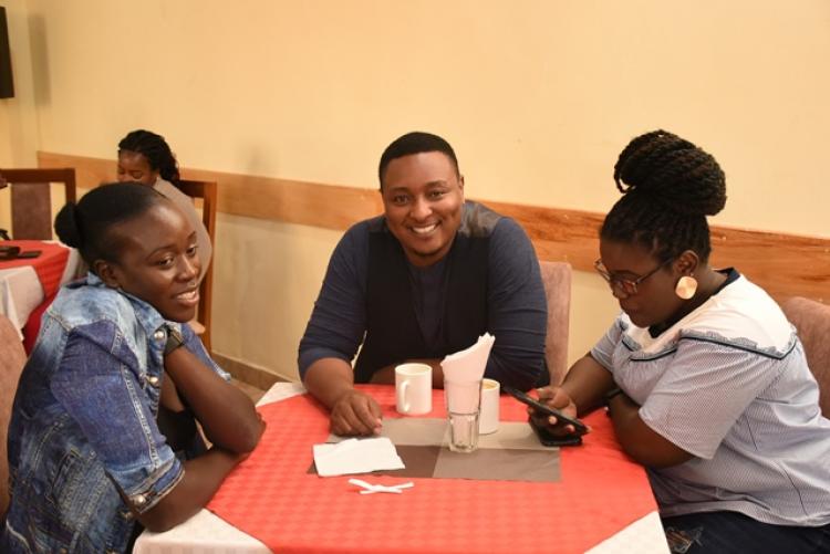 Mr Joshua Karani (middle) at the Exams Centre End of Year Party 2019