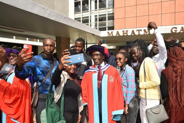DVC AA, takes selfies with freshers