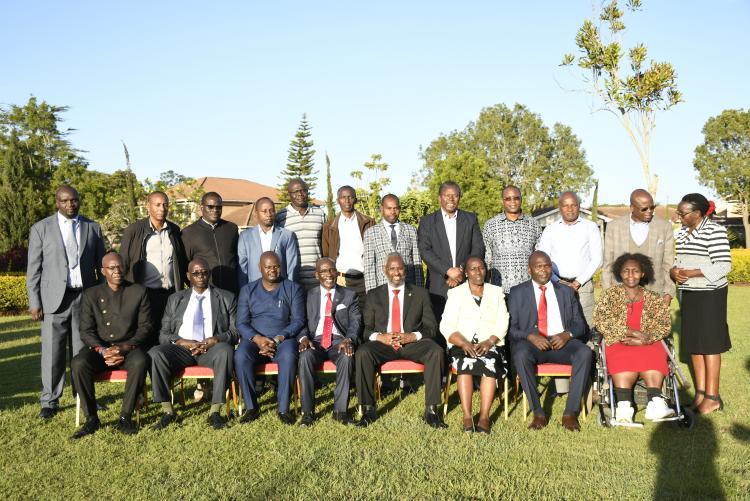 Group photo of administration and chairs from departments in Faculty of Arts and Social Sciences